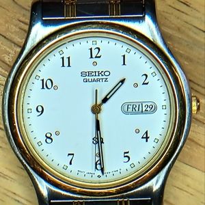 X Seiko SQ white dial, 35mm SS case, back, band, gold plated bezel and band.